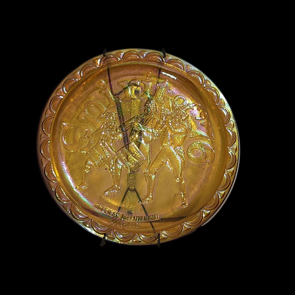 Indiana glass company.\n Vintage iridescent gold bicentennial plate.
